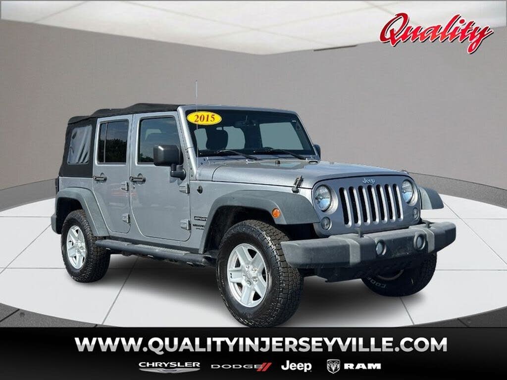 PRE-OWNED 2015 JEEP WRANGLER SPORT photo 1