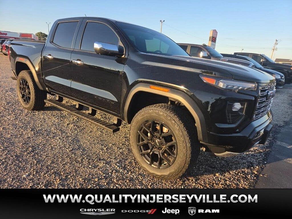 PRE-OWNED 2024 GMC CANYON DENALI photo 1