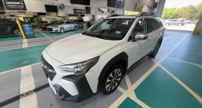 2023 Touring in White, 8,901 miles